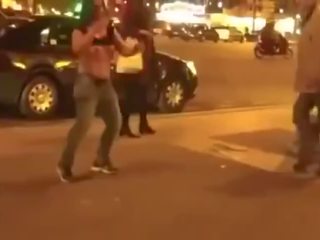 Drunk young female Strips In The Street