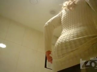 Delightful blonde in toilet shaved pussy and anus closeups.